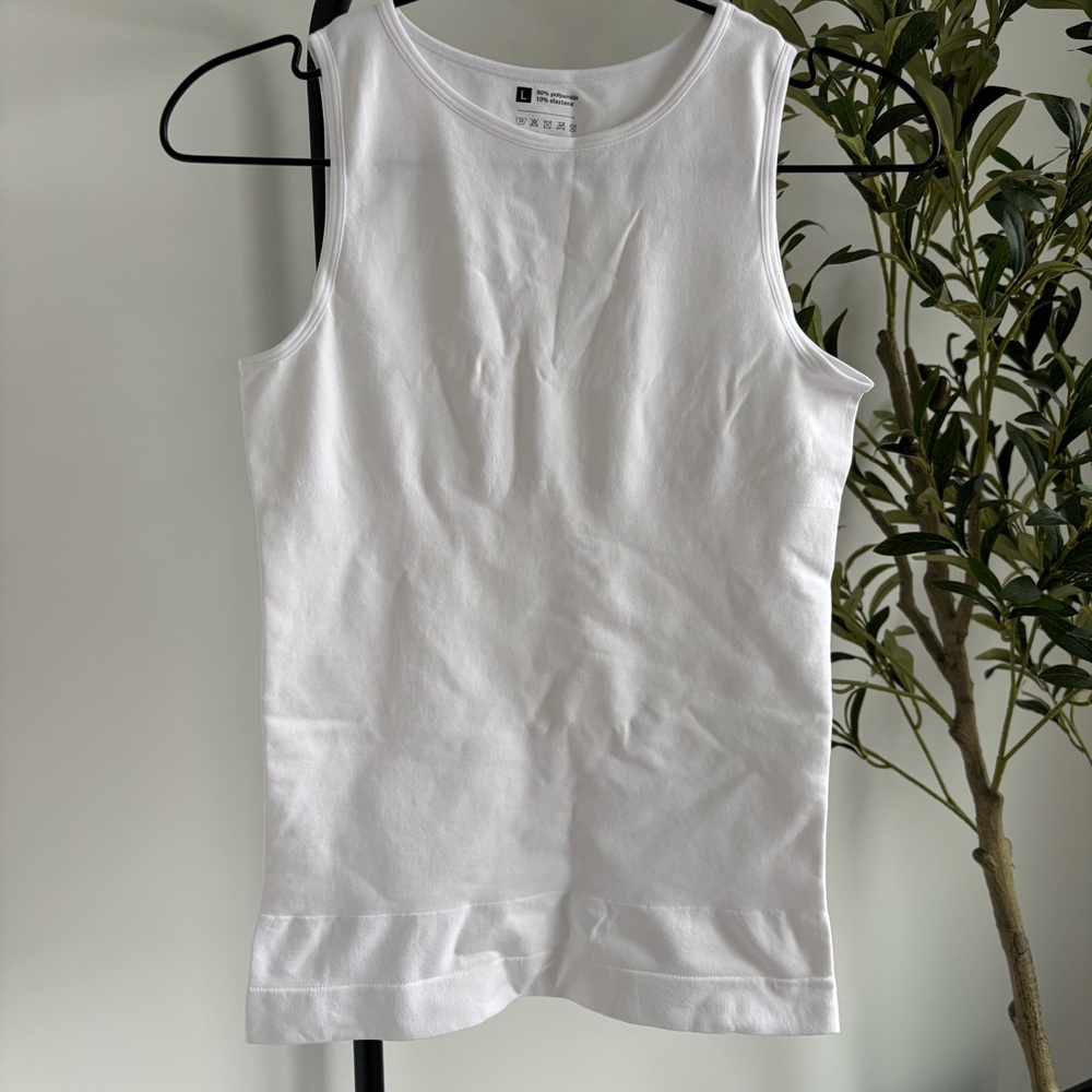 • White Sleeveless Top •